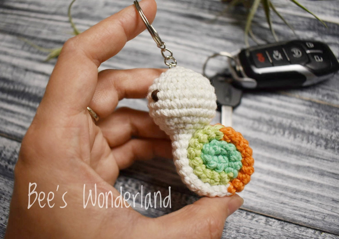 Snail crocheted keychain