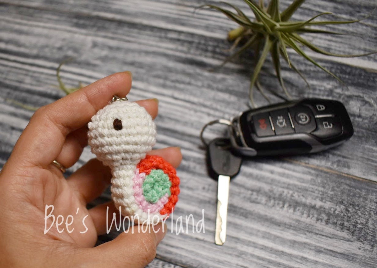 Snail crocheted keychain